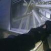 A brave Georgia Police smash the window of a burning home and rescue an elderly woman trapped inside.