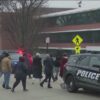 Illinois Police arrested five high school students in Chicago on Tuesday after a report of a student with a gun and set the whole campus into lockdown for a few hours.