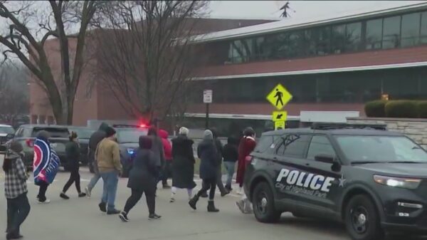 Illinois Police arrested five high school students in Chicago on Tuesday after a report of a student with a gun and set the whole campus into lockdown for a few hours.